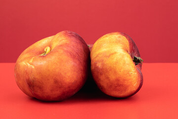 Donut Peaches isolated in red background
