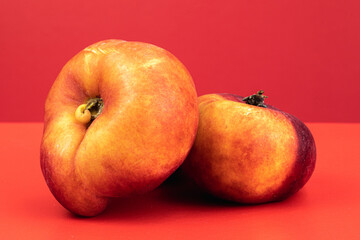 Donut Peaches isolated in red background