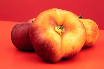 Donut Peaches isolated in red background
