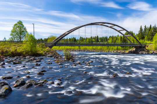 Sweden,NorrbottenCounty,River Slagnas and Burmabron bridge in summer