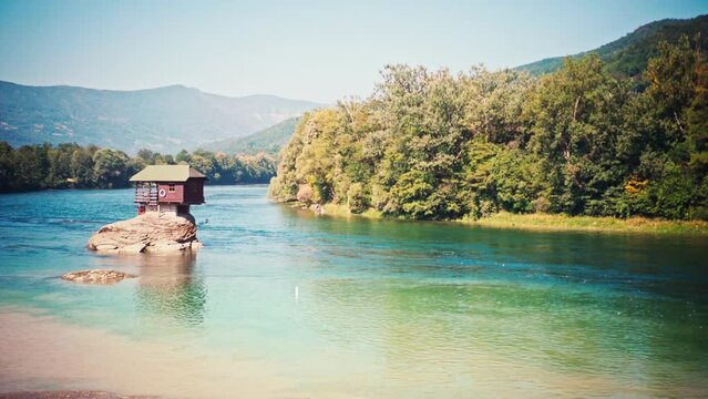 A beautiful view of the Lonely house on the river Drina in Bajina Basta, Serbia. Meditative calm footage. 