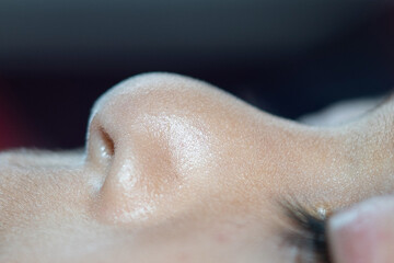 Naklejka premium Children's nose. macro 