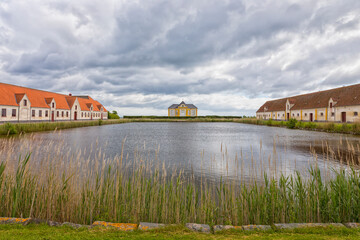 Naklejka na ściany i meble Pond, pavilion and farm buildings at Valdemar's Slot, Svendborg, Denmark