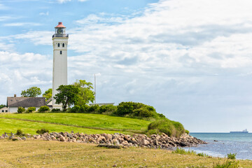 Fototapeta na wymiar Lighthouse at Keldsnor, Danish Baltic Sea island of Langeland