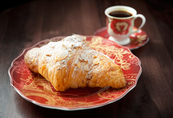 almond croissant and coffee
