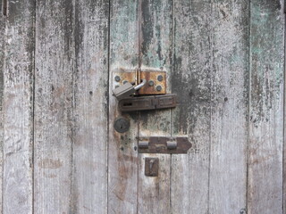 Metal Door locked on the wooden door