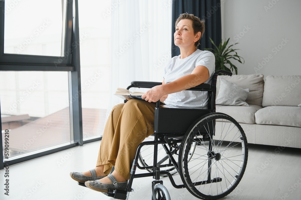 Poster Senior woman on a wheelchair