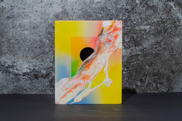 A retro future artwork with black worm hole, gradient pastel sky, with marble acrylic pour fluid...