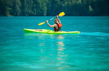 Kayaker in a Touring Kayak on the Scenic Lake
