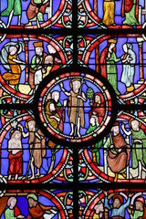 Fototapeta na wymiar Stained glass in Notre Dame de Coutances cathedral depicting scenes from Saint John the Baptist's life