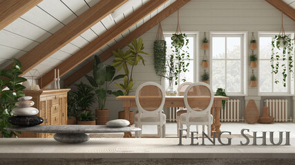 Wooden vintage table shelf with stone balance and 3d letters making the word feng shui over Bohemian wooden dining room in boho style, zen concept interior design