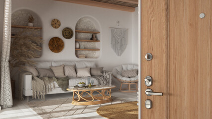 Obraz na płótnie Canvas Wooden entrance door opening on bohemian wooden living room in boho style. White fabric sofa and rattan furniture, interior design concept idea