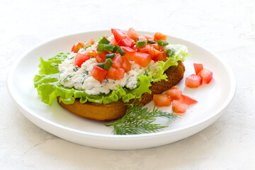 sandwich with tomatoes, green onions, ricotta cheese and fresh lettuce