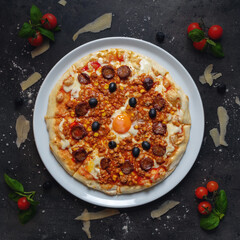Pizza Piedone style, Traditional Italian Pizza with Sasuages, Egg and Chillies Beans, Top Down Shoot, Appetizing Background