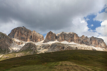 Naklejka premium italian mountains with clouds on Pordoi