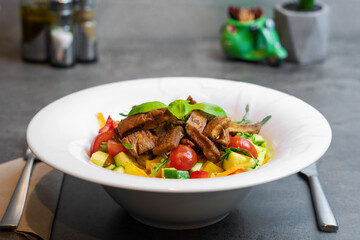 balsamic vinegar on a bed of lettuce