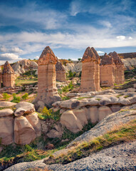 Vertical view of strange shapes of sandstone canyon, Goreme village location. Nice morning scene of , Cappadocia, Turkey, Asia. Beauty of nature concept background..