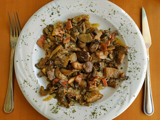 Sauteed of mushrooms and bacon.