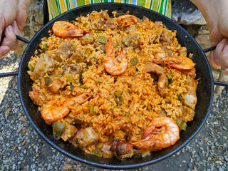 Cooking a paella.