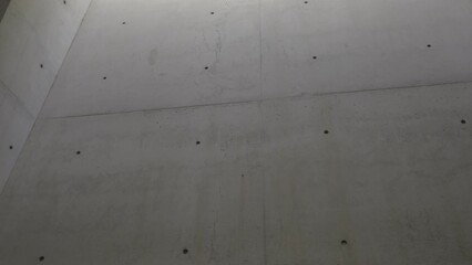 Concrete wall construction in minimalistic style architecture. Abstract interior architecture background