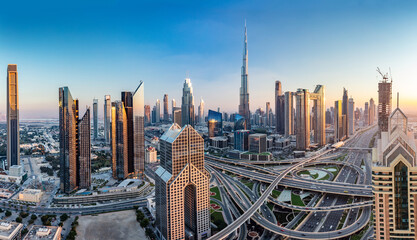 Fototapeta na wymiar Burj Khalifa in Dubai downtown skyscrapers highrise architecture at sunset