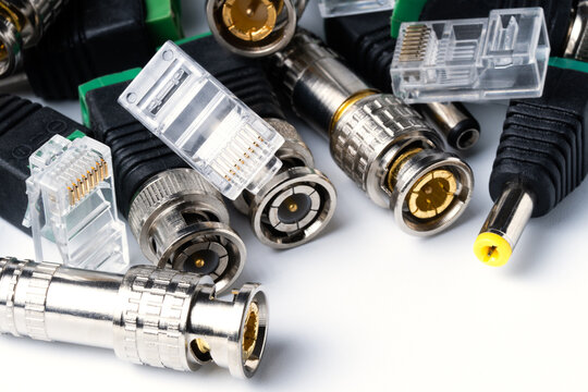 Various connectors for coaxial and twisted pair cable, for video signal transmission.