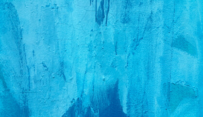 Bright blue painted wall texture with stains and smudges