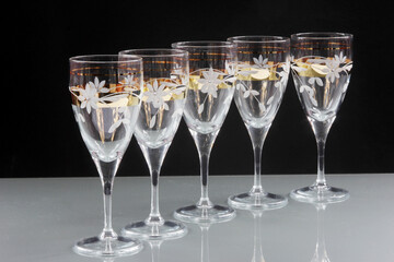 Empty crystal glass for wine on black background.