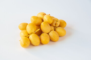 Fresh date palm fruit on white background