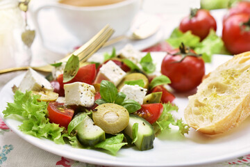 Fresh mediterranean style salad with feta and vegetables