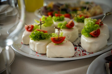 The banquet table. Tableware. Food, snacks, fruits, drinks