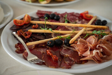 The banquet table. Tableware. Food, snacks, fruits, drinks
