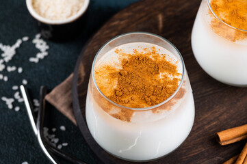 Delicious Horchata with cinnamon in the top. Rice water. Valencian Horchata made with rice, milk and cinnamon topping. Mexican drink. Vegetarian cocktail. Rice milk.