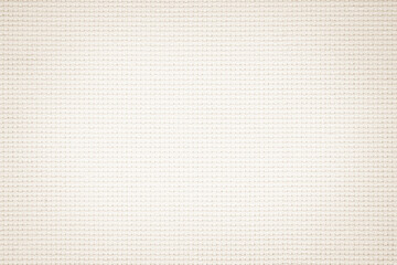 Fabric canvas woven texture background in pattern in light beige cream brown color.