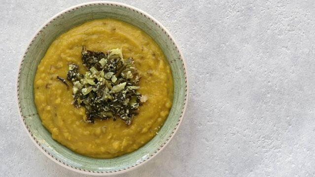 Toor dal with Sri Lankan type mallum (or mallung) made of chicory leaves and desiccated coconut. Table spin.