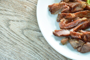 grilled slice pork steak dressing barbecue and salad on plate   