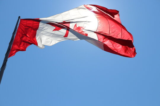 Canadian flag light by the sunlight