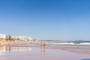 Fototapeta premium Armacao de Pera Algarve Portugal. Beautiful view on Atlantic ocean at day time and city