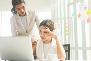 Business asian woman depressed or sad from workplace talking with friend for mental health...