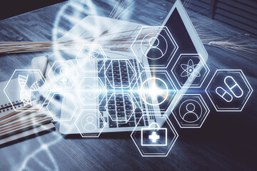 Desktop computer background and DNA drawing. Double exposure. Science concept.