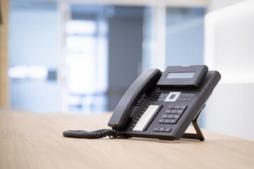 Close up telephone landline at office concept Communication support, call center and customer...