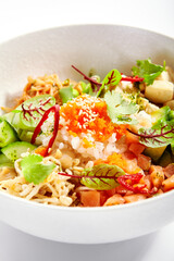 Poke with salmon, cut avocado and tofu closeup view