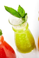 Kiwi and basil lemonade glass close up