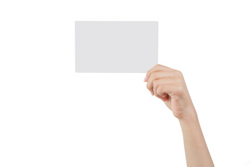 Obraz premium Hand of a young woman holding a white cardboard to mount an image or advertising text, with a white background