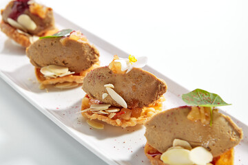 Turkey liver pate with berry sauce closeup view