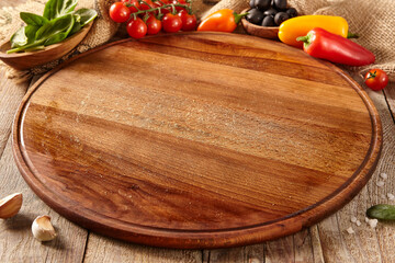 Cutting board on wooden surface