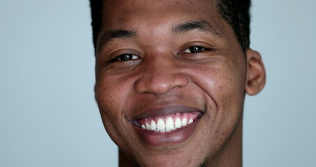 Obraz premium Handsome young black African person smiling portrait
