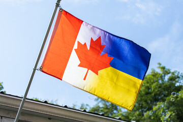 Flag of Canada and Ukraine. Friendship of countries. Aid to Ukraine