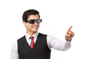 Businessman in a suit with virtual reality VR glasses hand touching virtual global internet connection metaverse on his head isolated on white background.