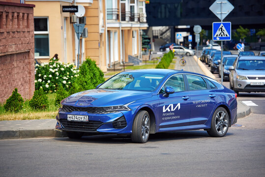 Minsk, Belarus. Jun 2022. Kia K5 car parked at city street. Blue Kia K5 - temporary replacement car for long repair works from Smolensk dealership, Russia parked in Minsk, Belarus.